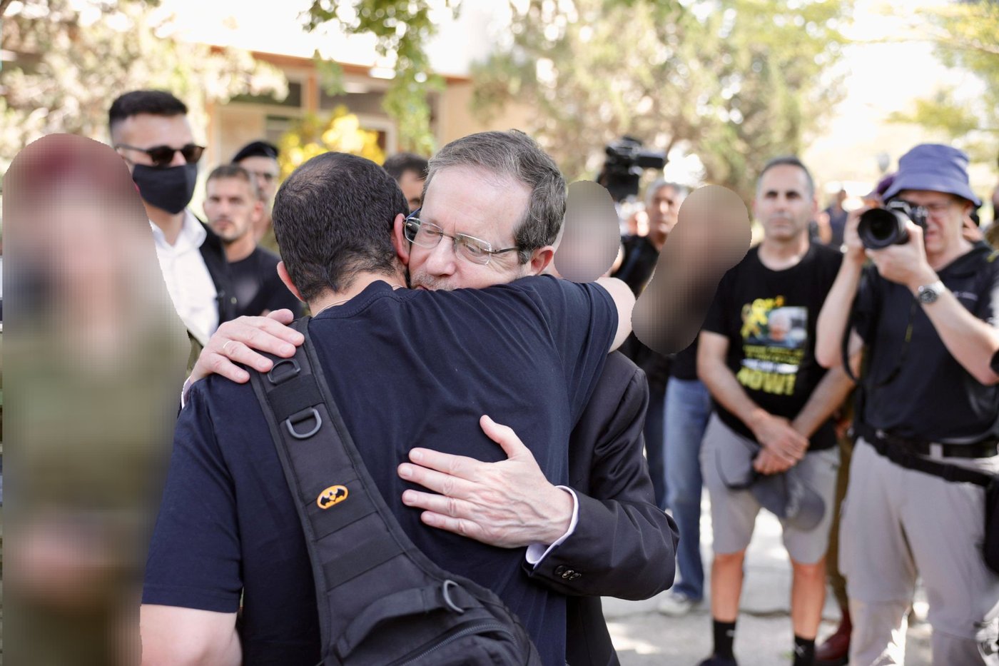 שורד השבי ירדן ביבס עם הנשיא הרצוג