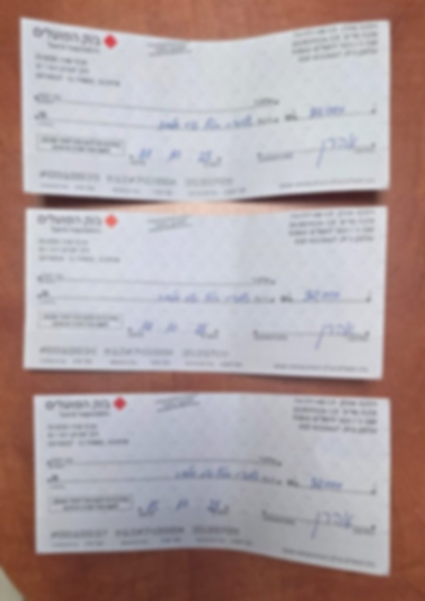 צ'קים על סך 90 אלף ש"ח שנתפסו ברשות החשודים