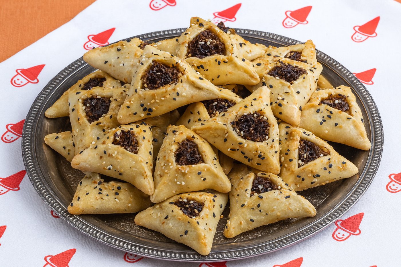 אזני המן במילוי בריסקט מפורק ברוטב ברביקיו