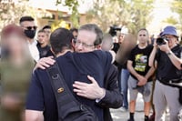 שורד השבי ירדן ביבס עם הנשיא הרצוג