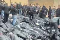 גופות של נרצחים בידי המשטר באיראן