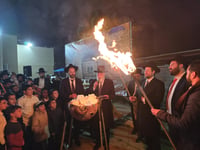 מעמד ההדלקה אצל רבי אברהם מאמאן