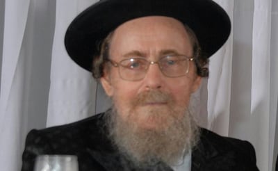 בעלה, הגה"צ רבי משולם זושא לוריא זצ"ל