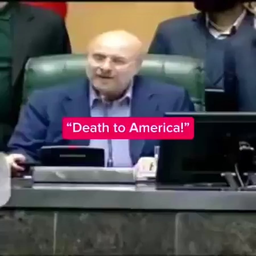  יו"ר הפרלמנט, מוחמד באקר קאליבאף.  קורא: מוות לאמריקה