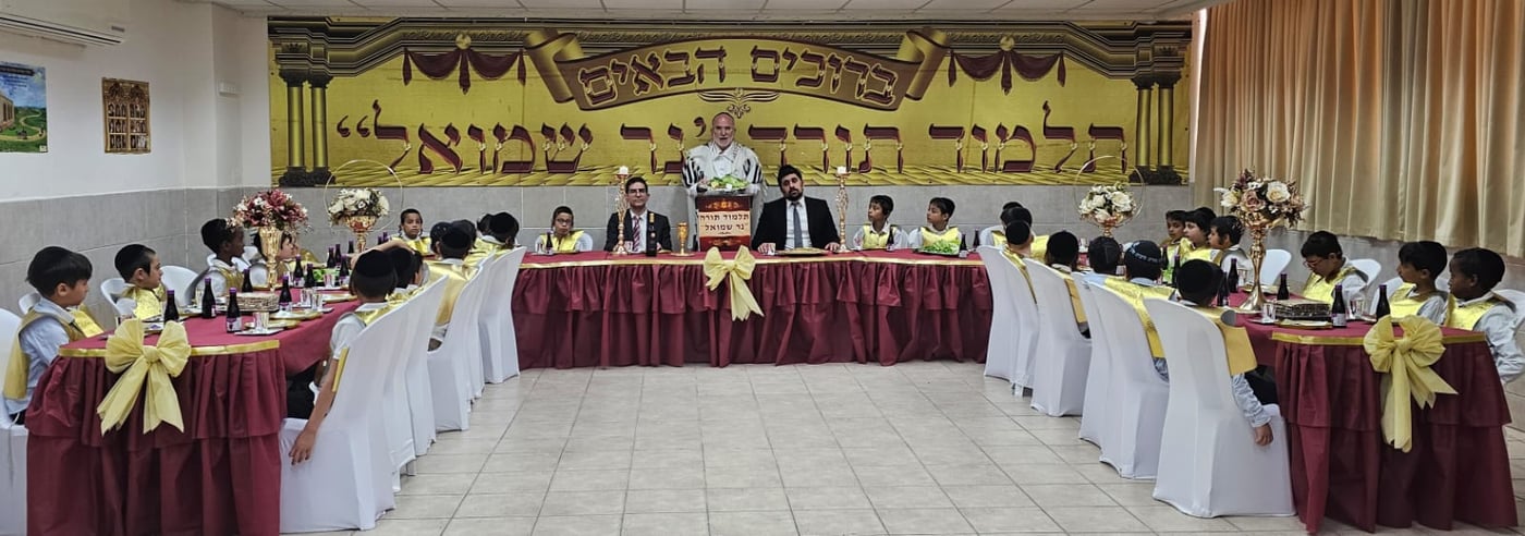 הדגמת עריכת שולחן "ליל הסדר" בתלמוד תורה "נר שמואל" חדרה