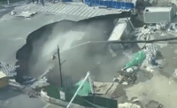 דרמה בשאנגחאי: האדמה פערה את פיה ובלעה כביש ראשי | צפו