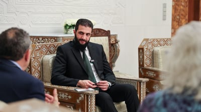 אל ג'ולאני עם אמו של הנעדר
