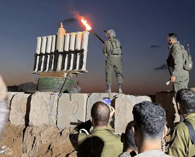 כך נראית הדלקת נר ראשון של חנוכה בכנסת - וכך זה נראה בשטח אויב | גלריה 