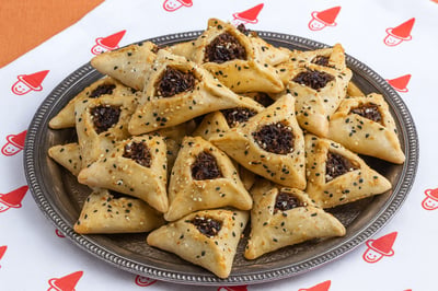 אזני המן במילוי בריסקט מפורק ברוטב ברביקיו