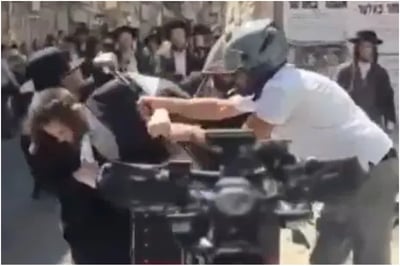רוכב חטף דגל פלסטיני מצעדה במאה שערים – הותקף ושרף את הדגל